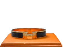 Load image into Gallery viewer, Hermès Clic H Gold + Black Metal Bracelet
