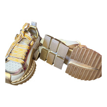 Load image into Gallery viewer, Dolce &amp; Gabbana Gold platform sneakers
