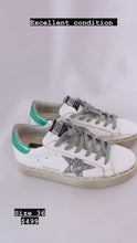 Load and play video in Gallery viewer, Golden Goose Hi Star Low Top Sneakers
